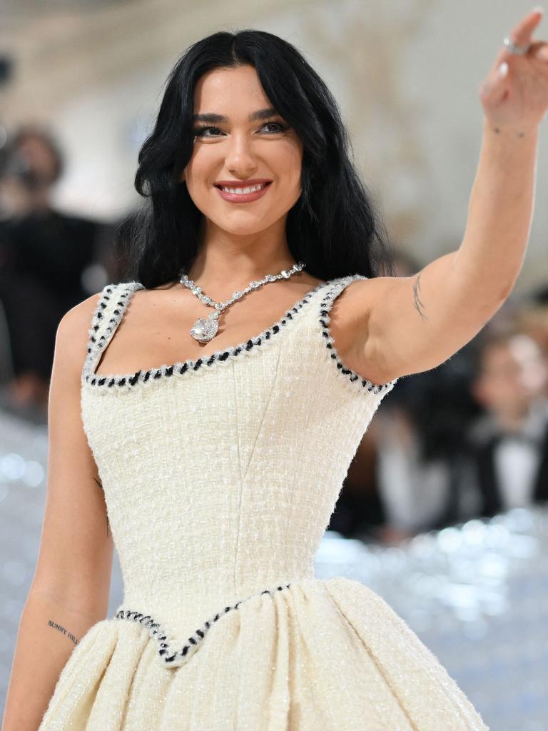 Dua Lipa wears Claudia Schiffer's iconic 1992 Chanel bridal tweed gown