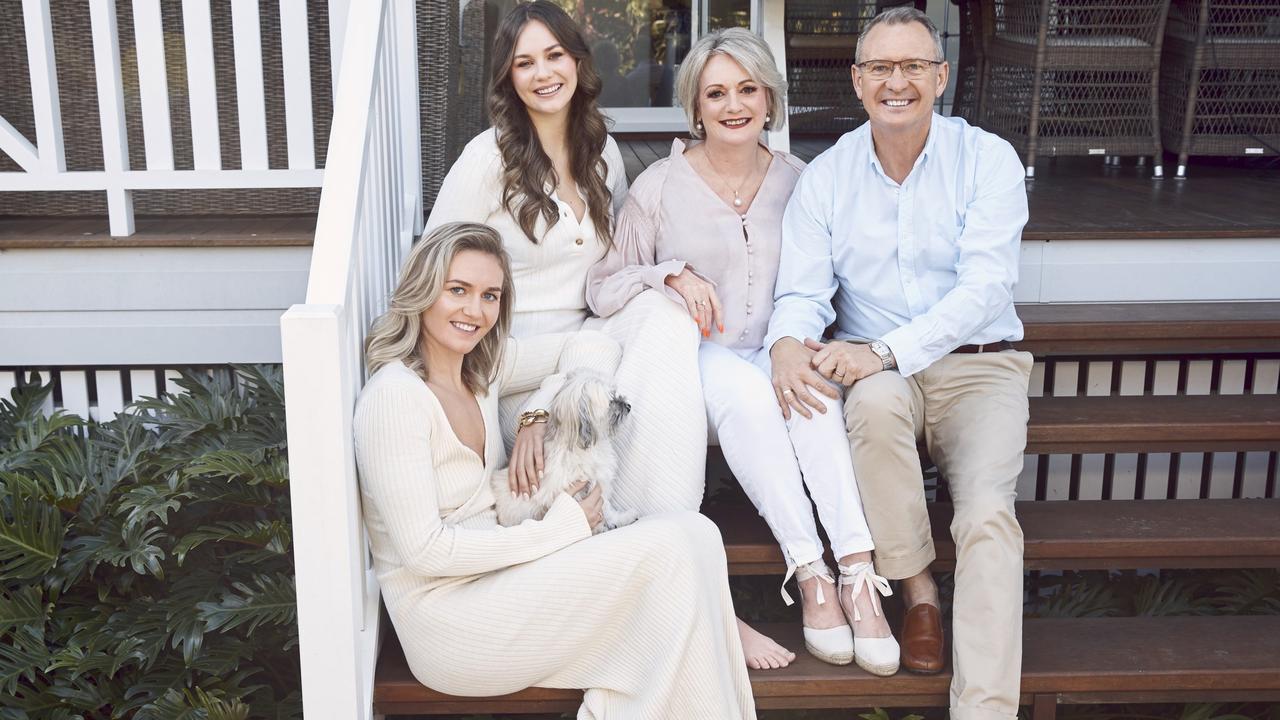 Ariarne Titmus (front), Mia Titmus, mum Robyn Titmus and dad Steve Titmus at the back veranda of their Chelmer family home. Photo: Peter Brew-Bevan/Australian Women's Weekly.