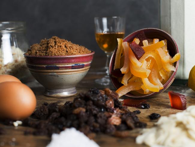 Christmas pudding ingredients on an old wooden table