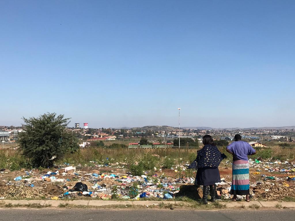 An overview of the township with the power station in the horizon.