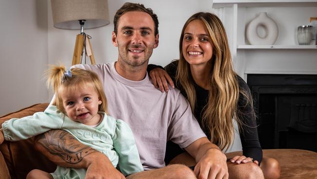 Port Adelaide star Jeremy Finlayson and Kellie Gardner and their daughter Sophia in February. Picture: Tom Huntley