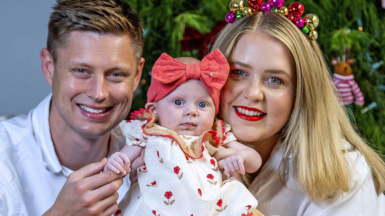 Hannah and Simon Potts with Cutest Spring Baby winner Poppy in front of their Christmas tree at their Klemzig home. Picture Mark Brake