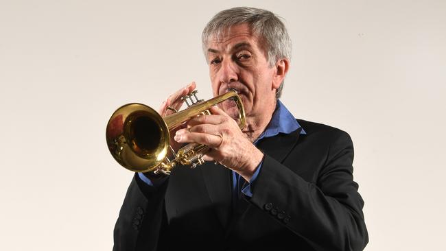 Wayne Bowden received a medal for his outstanding contributions to the field of music. Photo: Julian Smith