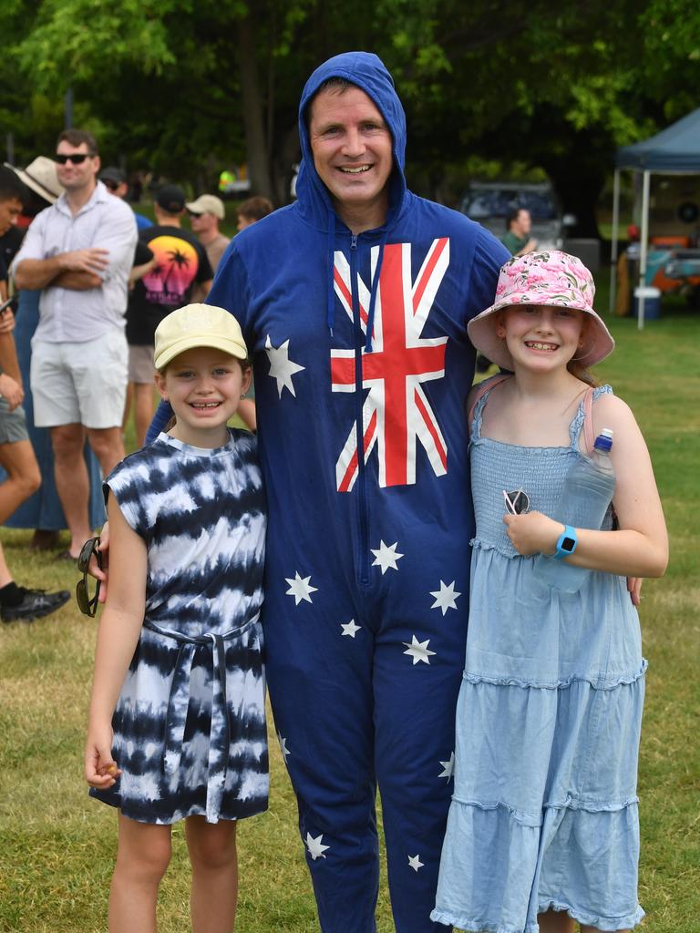 Luke Perkins with Kensi and Aiya at the raising of the flag ceremony at Australia Day at Jezzine Barracks. Picture: Evan Morgan