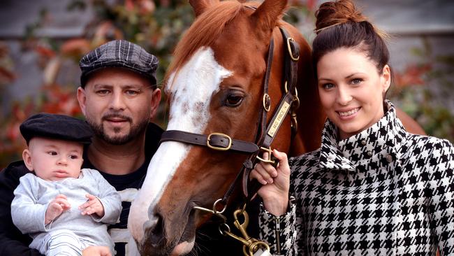 Part-owner Ozzie Kheir and his wife Linsey and baby Lenni.