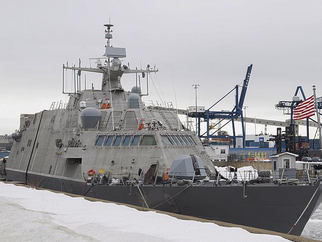 The USS Little Rock is moored in Montreal's old port, Sunday, Jan. 21, 2018. A newly commissioned Navy warship will be wintering in Montreal after its journey to Florida was interrupted by cold and ice.  (Graham Hughes/The Canadian Press via AP)