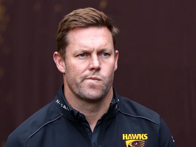 MELBOURNE, AUSTRALIA - JUNE 01: Sam Mitchell, Senior Coach of the Hawks walks out onto the field during the round 12 AFL match between Hawthorn Hawks and Adelaide Crows at Melbourne Cricket Ground, on June 01, 2024, in Melbourne, Australia. (Photo by Quinn Rooney/Getty Images)