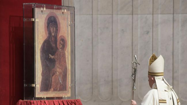 Pope Francis stand by the "Salus populi romani" Byzantine icon of the Madonna and Christ Child, at the end of Easter's Holy Saturday Vigil.