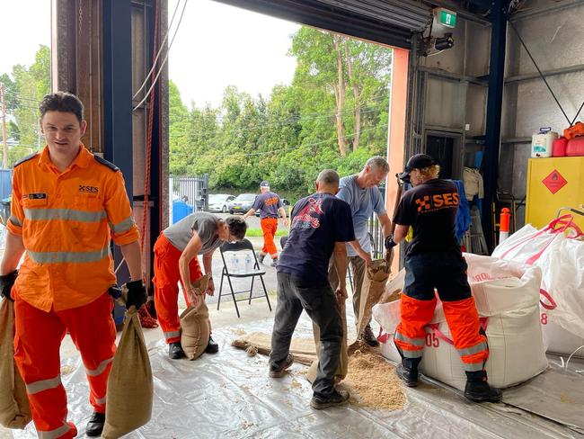 SES volunteers filling sandbags at the Manly unit depot on Tuesday. Picture: SES Manly