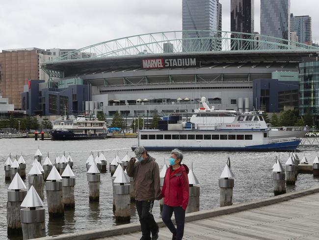 MELBOURNE, AUSTRALIA- NewsWire Photos. OCTOBER 9, 2020: A couple take a walk at Docklands during COVID-19 lockdown in Melbourne. Picture: NCA NewsWire/ David Crosling