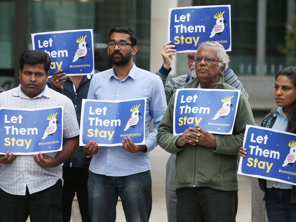 A group of supporters for the family are seen in front of the Federal Court of Australia in Melbourne in February last year. Picture: David Crosling