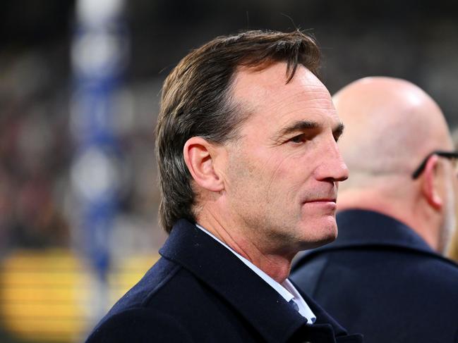 MELBOURNE, AUSTRALIA - MAY 25: AFL CEO Andrew Dillon watches on in the Long Walk during the round 11 AFL match between Richmond Tigers and Essendon Bombers at Melbourne Cricket Ground, on May 25, 2024, in Melbourne, Australia. (Photo by Morgan Hancock/AFL Photos/via Getty Images)