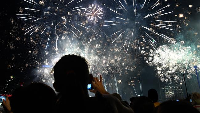 Tens of thousands of people will crowd into Brisbane’s CBD and suburban vantage points to watch Brisbane fireworks displays. Picture: AAP/Dan Peled