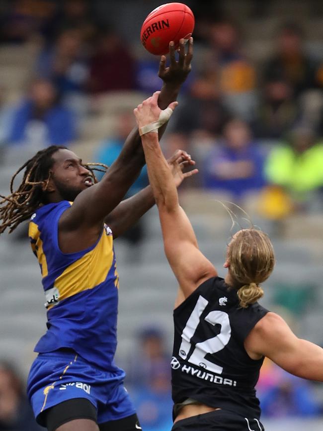 PERTH, AUSTRALIA – AUGUST 09: Nic Naitanui of the Eagles and Tom De Koning of the Blues contest the ruck during the round 11 AFL match between the West Coast Eagles and the Carlton Blues at Optus Stadium on August 09, 2020 in Perth, Australia. (Photo by Paul Kane/Getty Images)