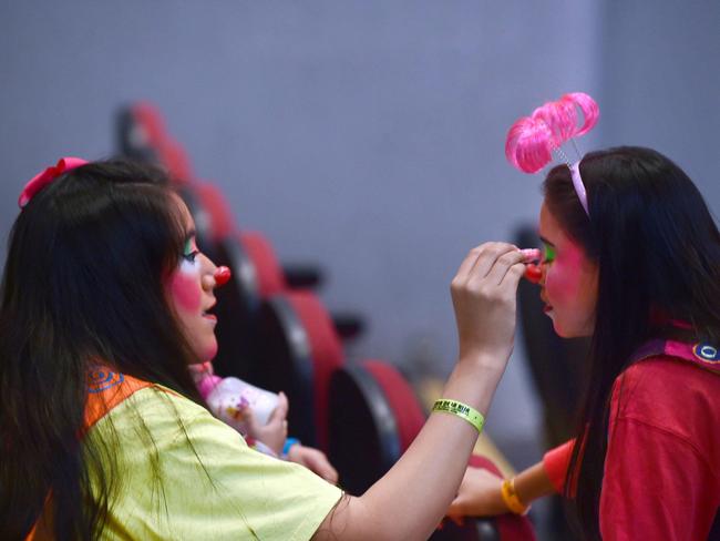 <!DOCTYPE html PUBLIC "-//W3C//DTD HTML 4.0 Transitional//EN" "http://www.w3.org/TR/REC-html40/loose.dtd"><html><body><p>A clown and her daughter get ready during the second day of the XXI Convention of Clowns, at the Jimenez Rueda Theatre, in Mexico City on October 19, 2016. Picture: AFP PHOTO / Alfredo ESTRELLA</p></body></html>