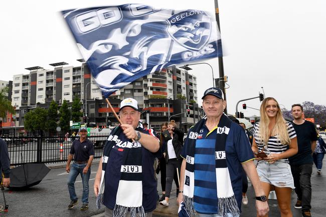 BRISBANE, AUSTRALIA - OCTOBER 24: A Geelong supporter shows his colours before the 2020 AFL Grand Final match between the Richmond Tigers and the Geelong Cats at The Gabba on October 24, 2020 in Brisbane, Australia. (Photo by Bradley Kanaris/AFL Photos/via Getty Images)