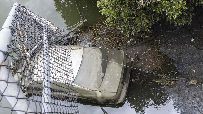 This car has been in the river since into plunged into there on August 28. Picture: Matthew Vasilescu