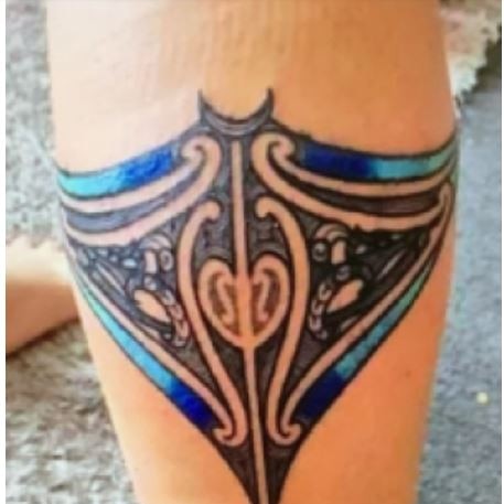 Leah Cooper has a distinctive tattoo on her calf. Picture: Supplied