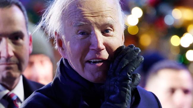 WASHINGTON, DC - DECEMBER 05: U.S. President Joe Biden yells out to the press while departing the 102nd National Christmas Tree Lighting Ceremony on the Ellipse on December 05, 2024 in Washington, DC. The 2024 National Christmas Tree is a 35-foot Red Spruce from the George Washington and Jefferson National Forests in Virginia.   Kevin Dietsch/Getty Images/AFP (Photo by Kevin Dietsch / GETTY IMAGES NORTH AMERICA / Getty Images via AFP)