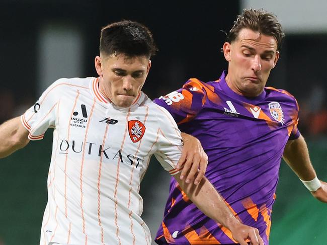 PERTH, AUSTRALIA - FEBRUARY 17: Joe Caletti of the Roar passes the ball away during the A-League Men round 17 match between Perth Glory and Brisbane Roar at HBF Park, on February 17, 2024, in Perth, Australia. (Photo by James Worsfold/Getty Images)