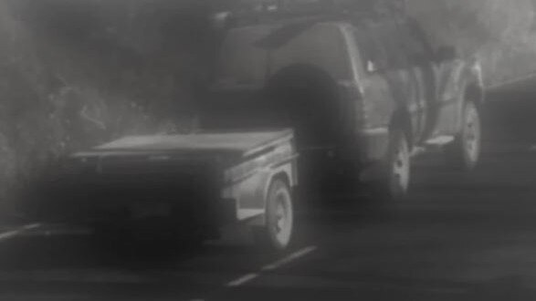 A dark blue four-wheel drive and trailer spotted leaving the Wonnangatta Valley campsite the day Carole Clay and Russell Hill vanished.