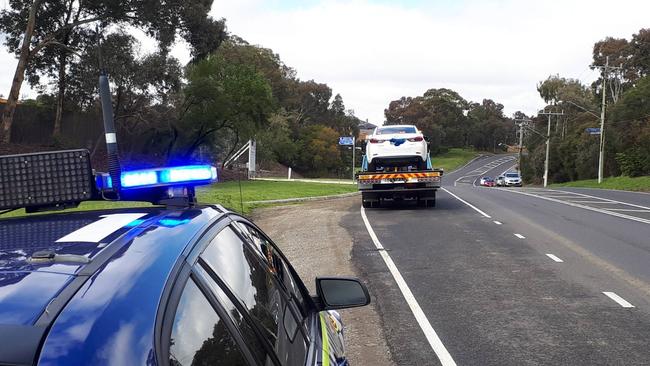 The woman had her car impounded for driving without a licence.