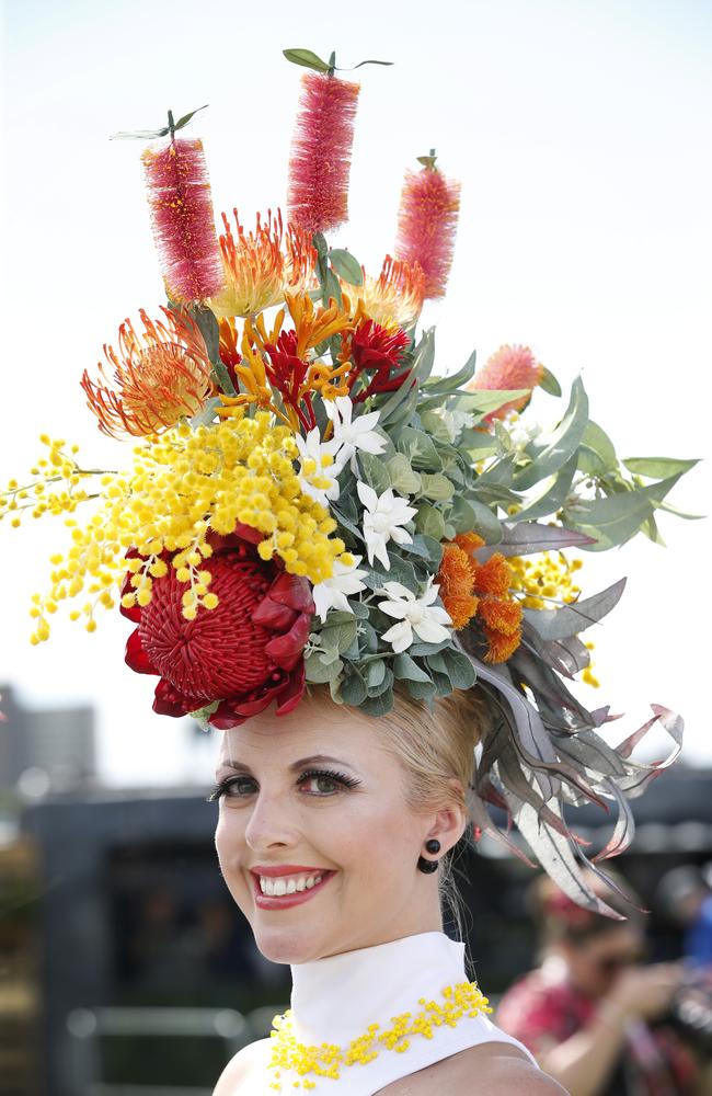 Melbourne Cup Day 2014 Myer Fashion in the Field at Flemington Racecourse. Leeanne Symes wearing a native flower hat by Peggy Lee. Picture: David Caird.