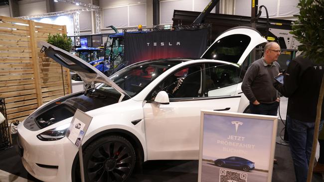 The Tesla-drivers have no qualms about sneering at those who drive “oversized” utes and 4WDs. Picture: Getty Images