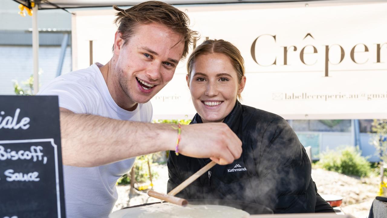 Dean Baxendale and Emily Scott prepare their La Belle Creperie crepes at the Toowoomba Farmers Market, Saturday, July 16, 2022. Picture: Kevin Farmer