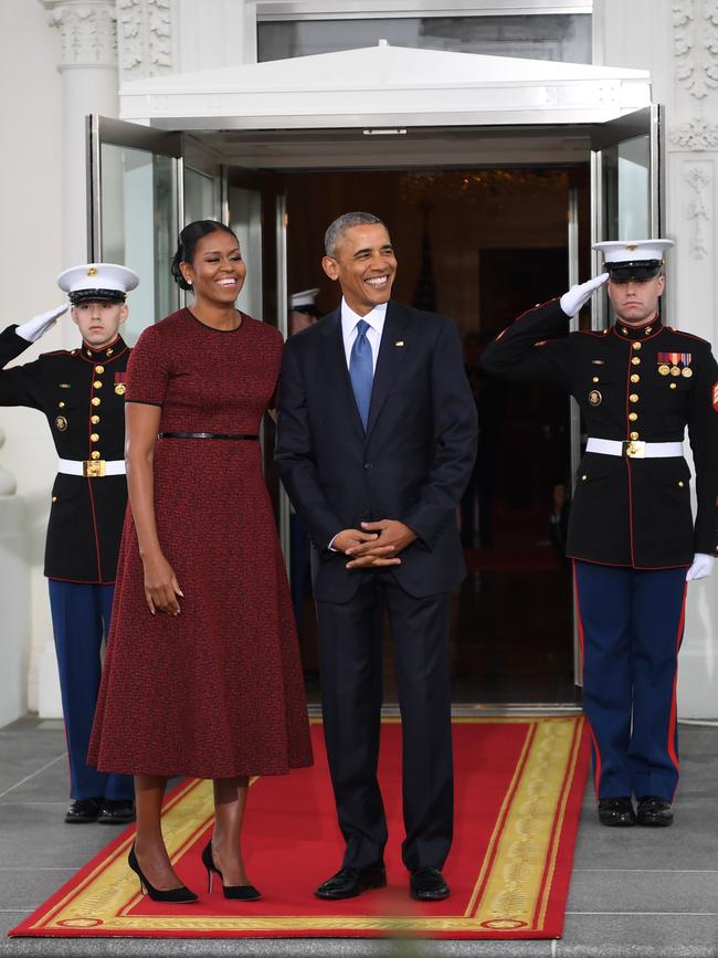 US President Barack Obama and First Lady Michelle Obama prepare to greet President-elect Donald Trump and his wife Melania to the White House in Washington, DC on January 20, 2017. Picture: AFP