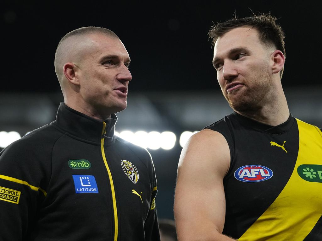 Dustin Martin speaks with Noah Balta. Picture: Daniel Pockett/Getty Images.