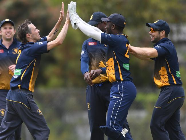 Strathmore celebrates a wicket last season.