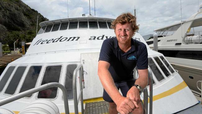 Max Allen Jnr from Freedom Fast Cats onboard Freedom Adventurer tied up at Pier One at Rosslyn Bay.   Photo: Chris Ison / The Morning Bulletin. Picture: Chris Ison ROK290115cfreedom3