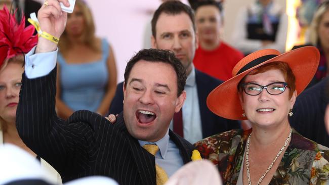 Marise Payne with her partner Stuart Ayres celebrating a win on Melbourne Cup Day. Picture: Aaron Francis/The Australian