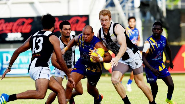 Daniel Motlop, pictured with the ball playing in Darwin last year, made his debut for Kenilworth on Saturday and kicked two goals. Picture: Elise Derwin.