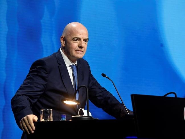 In this handout photograph released by UEFA on April 20, 2021, FIFA president Gianni Infantino  addresses the UEFA Congress in Montreux. - FIFA boss Gianni Infantino on April 20, 2021, has blasted  the proposed European Super League and warned that the clubs involved could face 