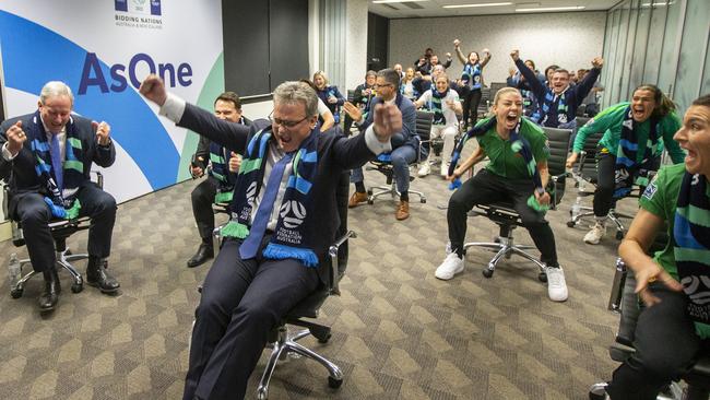 Chairman of Football Federation Australia Chris Nikou along with officials and players following FIFA’s announcement. Picture: Jenny Evans/Getty Images