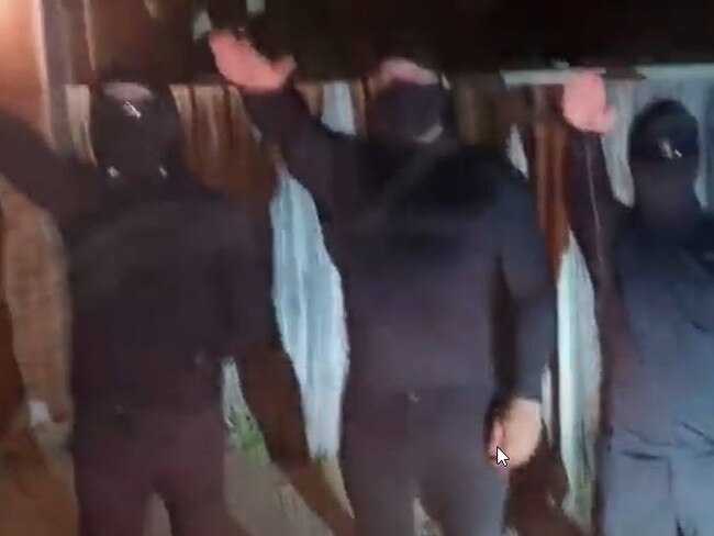 The men in the video raise their hands in a Nazi salute. Picture: Supplied/YouTube