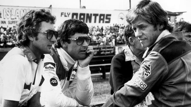 Mobil Holden Dealer Team’s John Harvey with racing drivers Peter Brock and Dick Johnson before final race of deciding round of 1981 Australian Touring championship at Lakeside.