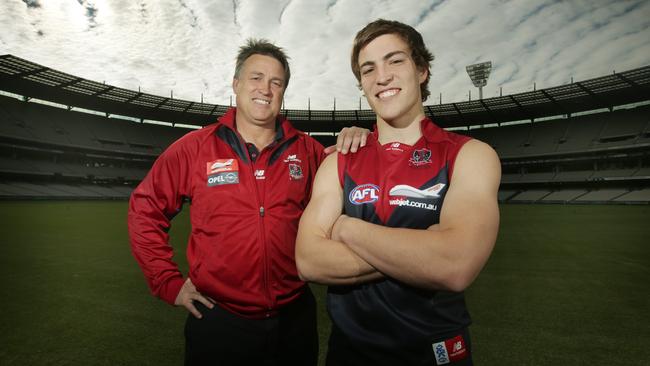 Jack Viney with his dad Todd at the MCG in 2012 when the Melbourne Football Club announced it would be drafting him under the AFL’s father-son rule.