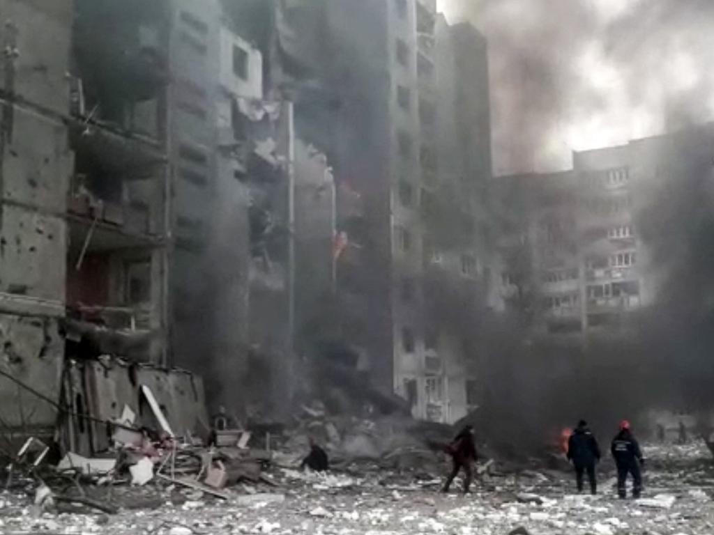 This grab made from a handout video released by the State Emergency Service of Ukraine, shows a damaged apartment building which is said was hit by shelling in Chernihiv. Picture: AFP