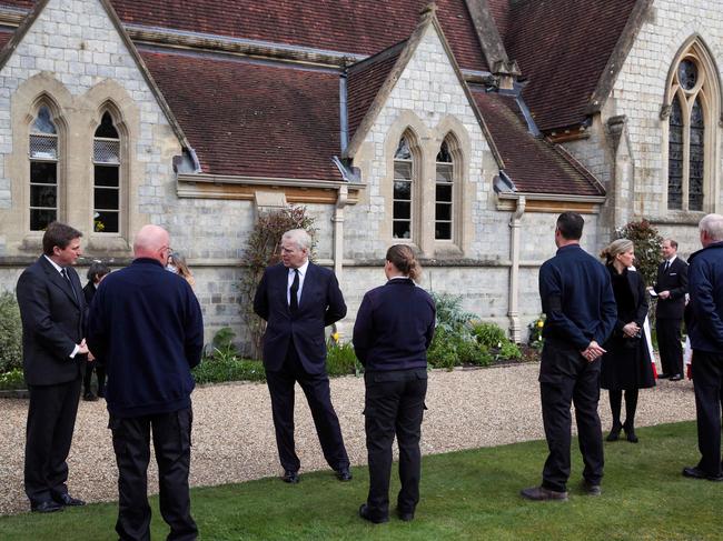 Prince Andrew, Sophie, Countess of Wessex, (3R) talk with Crown Estate staff as they attend the Sunday service at the Royal Chapel of All Saints, at Royal Lodge, in Windsor. Picture: AFP