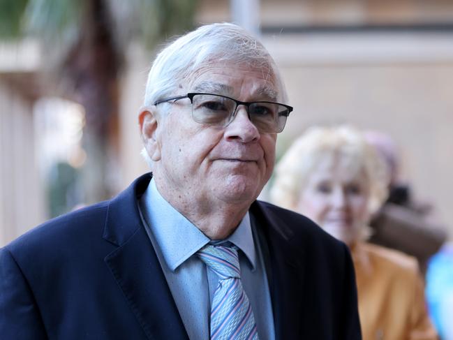 SYDNEY, AUSTRALIA - NewsWire Photos JUNE 10, 2022:  Brian Burston pictured with his wife Rosalyn as they arrive at the Federal Court, Sydney CBD. Former senator Brian Burston suing One Nation leader Pauline Hanson over a series of allegations he sexually assaulted staffers. Picture: NCA NewsWire / Damian Shaw