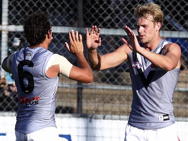 AFL - JLT - Port Adelaide v Adelaide at Alberton Oval. Jack Watts celebrates another goal with Steven Motlop. Picture Sarah Reed