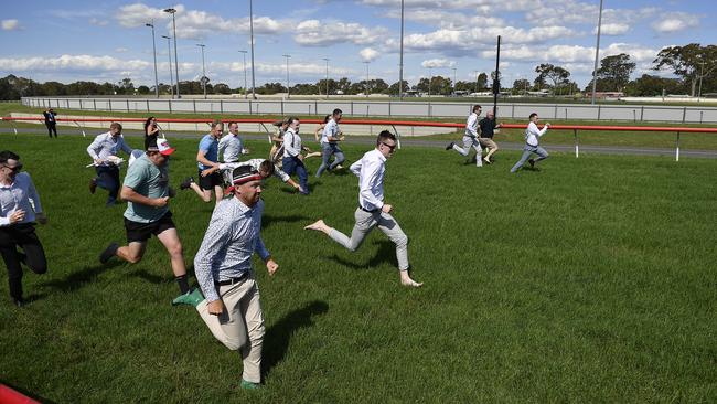 Bet365 Traralgon Cup Day, held at Traralgon Racecourse, Traralgon, Victoria, 1st December 2024. The Cup race meeting was cancelled due to a heavy track. Despite this, many patrons attended. Patrons run their own race on the track. Picture: Andrew Batsch