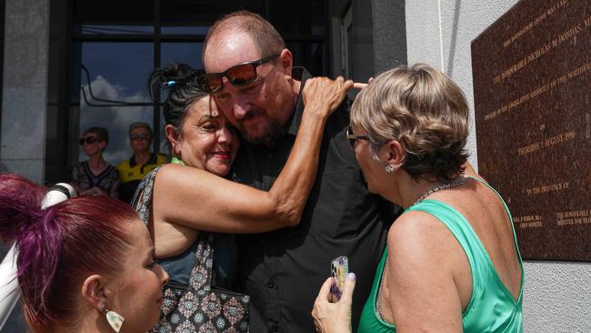 Declan Laverty’s father, Damian Crook, hugged by supporters. Picture: PEMA TAMANG Pakhrin