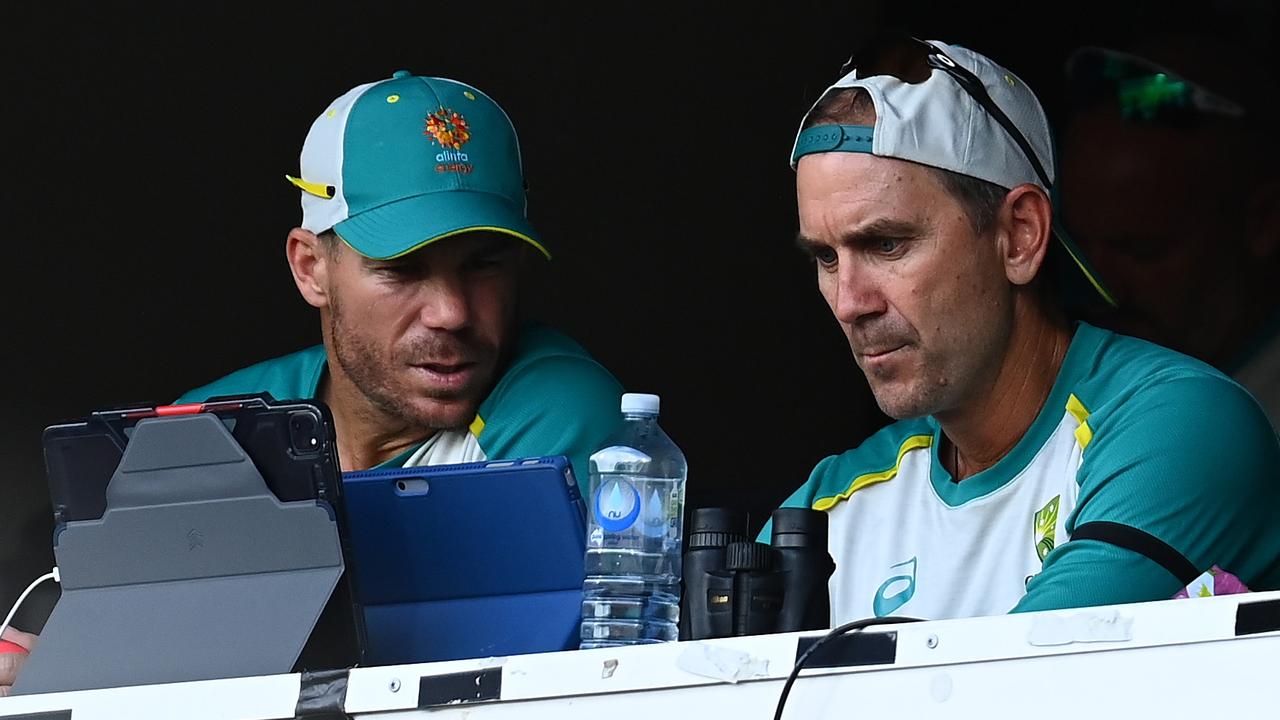 David Warner and Langer during the second Ashes Test at the Adelaide Oval. Picture: Getty Images