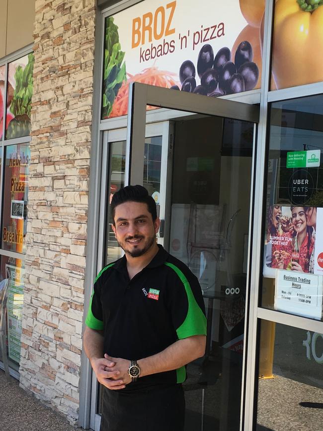 Broz Kebabs co-owner Sam Shinwari was all smiles outside his store which reopened on Tuesday. Picture: Darren Cartwright