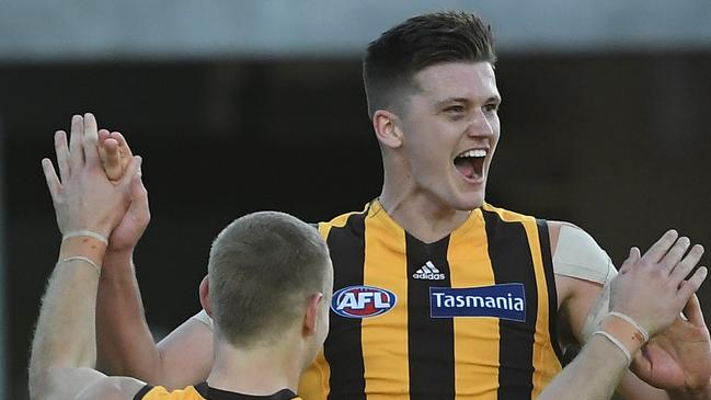 Mitchell Lewis of the Hawks (right) reacts after kicking a goal during the Round 17 AFL match between the Hawthorn Hawks and the Fremantle Dockers at UTAS Stadium in Launceston, Saturday, July 13, 2019. (AAP Image/Julian Smith) NO ARCHIVING, EDITORIAL USE ONLY