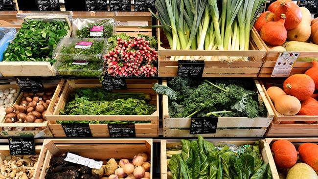 Organic vegetables are on sale in an organic supermarket in Saintes, western France, on October 23, 2018. - According to the public information platform Agence Bio, organic products' consumption represented over 8,3 billion euros in 2017. The French governement plans to increase the proportion of organic food in large surface supermarkets from 6% to 15% by 2022. (Photo by GEORGES GOBET / AFP)